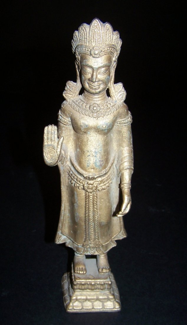 Cambodian Religious Figure. 11 1/2” x 3” x 3”: Cambodian Religious Figure. Metal. 11 1/2” x 3” x 3”
