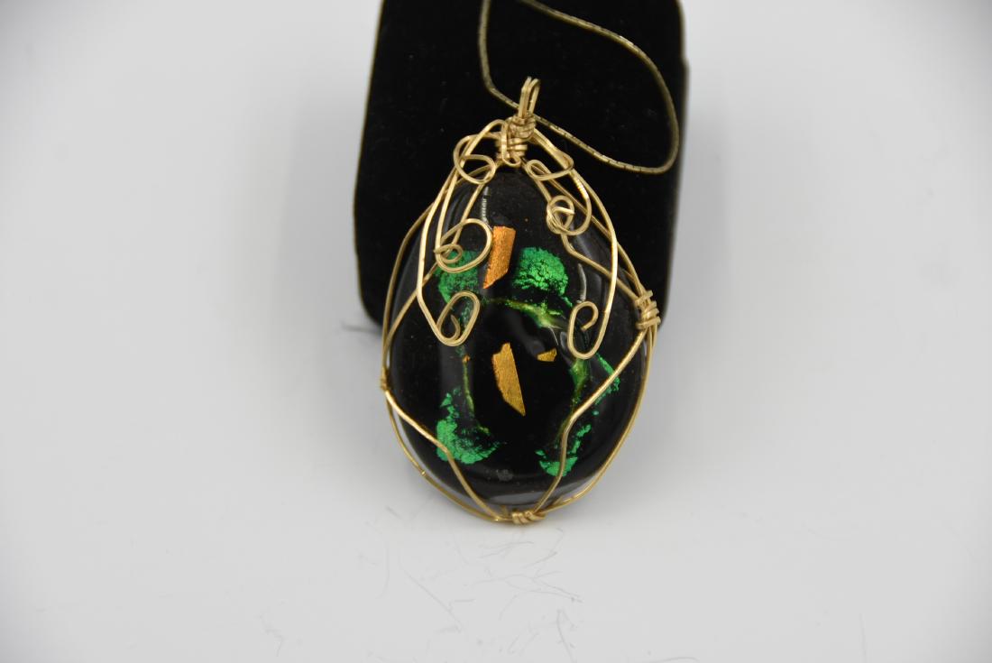 Deciduous Glass Necklace by Betty Kitchridge: Designed by Betty kitchridge who was 102 at the time and an original designer for Tiffany NY 2.5" x 1.5" length 18"