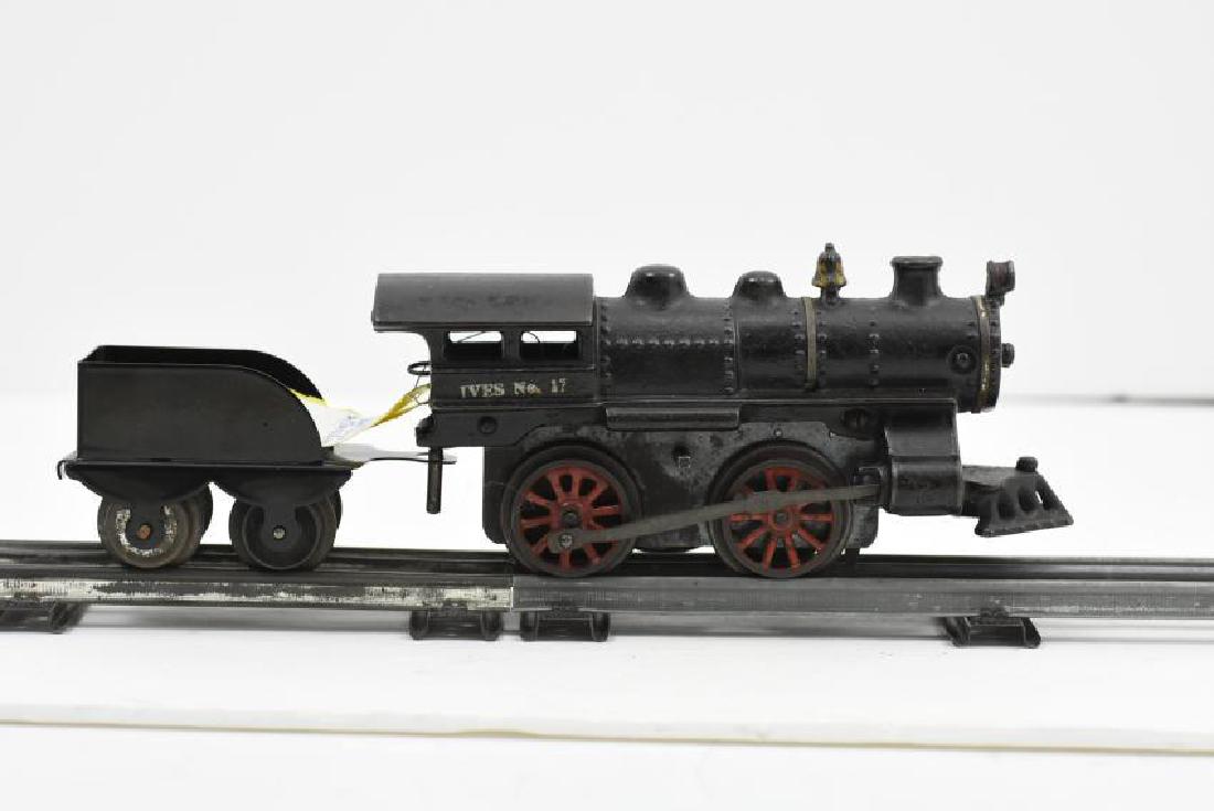 Ives Wind Up Train no. 17: Description:Â Ives no.17 with repro tender. Measures 7.25"L x 3.25H x 2.5"W