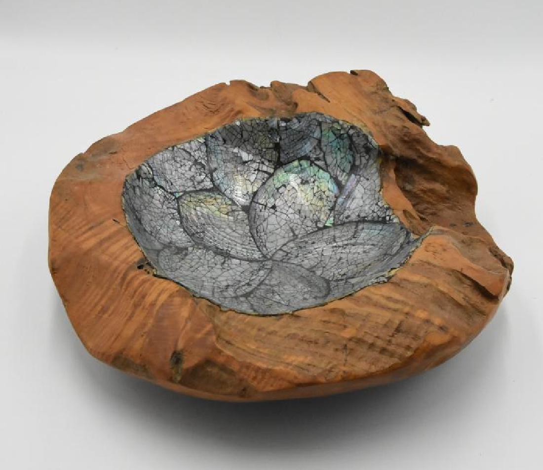 Teak bowl with Shell inlay: Shelly bowl with shell natural interior. Teak wood Dimensions: 13L x 10 3/4w x 4H/in