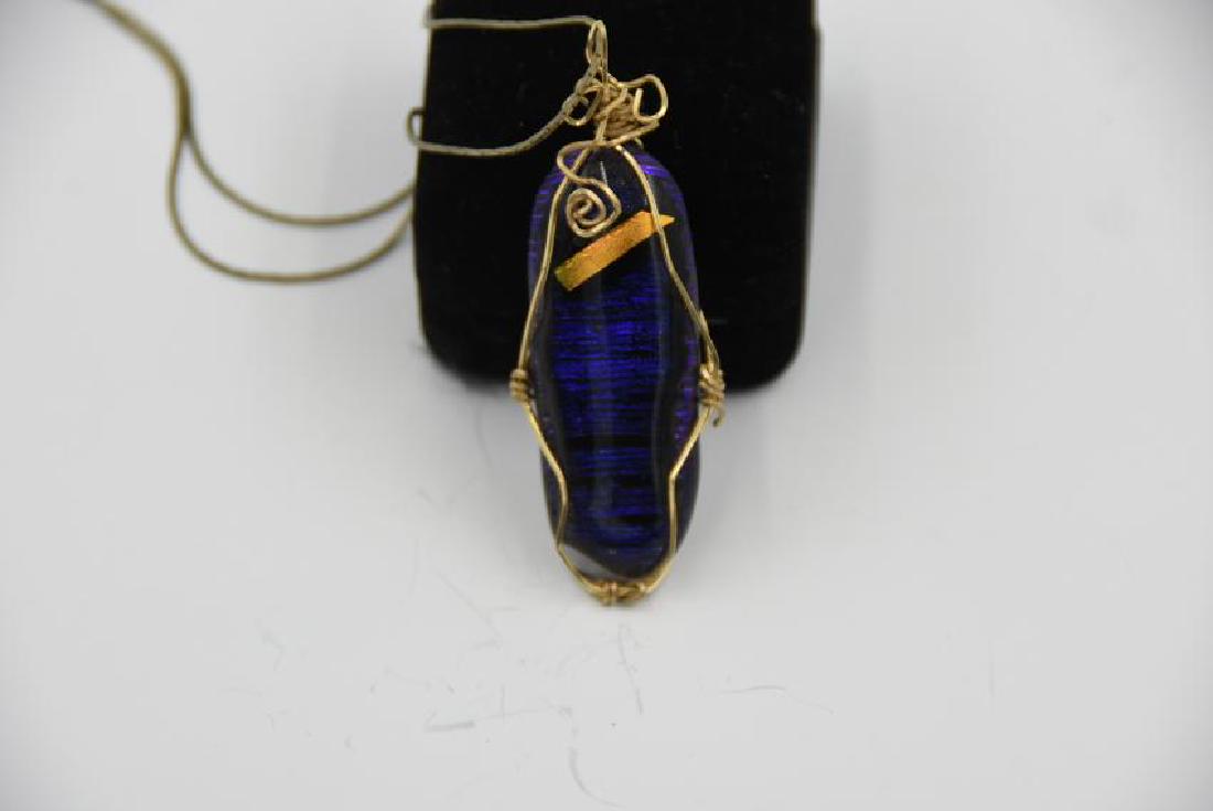 Deciduous Glass Necklace by Betty Kitchridge: Designed by Betty kitchridge who was 102 at the time and an original designer for Tiffany NY size 2 3/4" x 1"