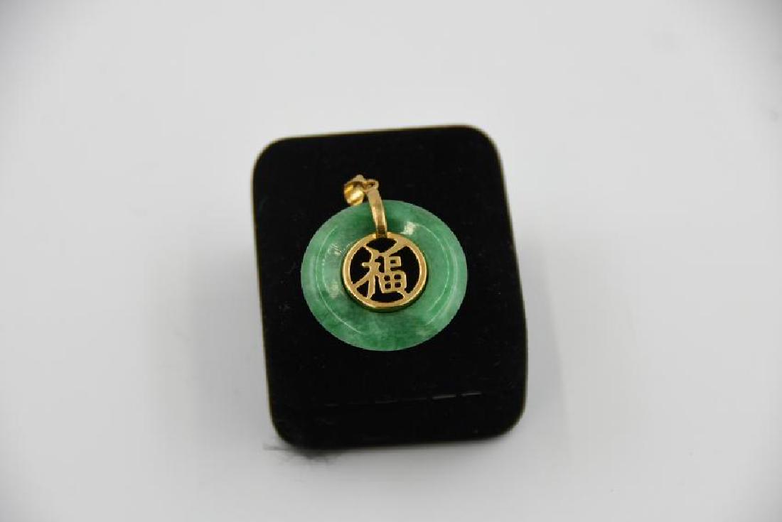 Jade and gold pendant: 1 1/8"