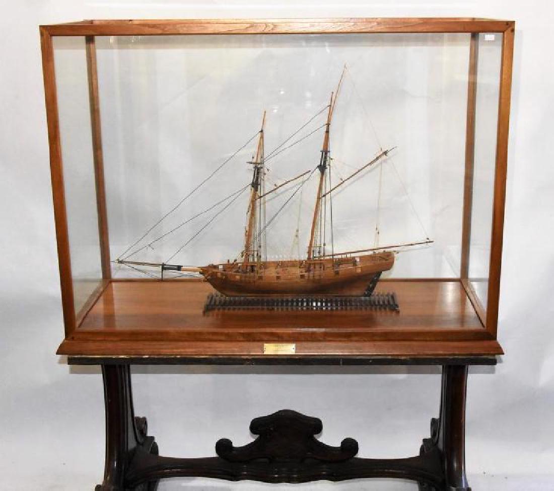 Sailing Ship Two Mast Fore & Aft rigged Ship in Glass: Wooden Model ship 1812 Lynx Baltimore Schooner. Comes WITH CASE AND Table from 1700s IN PICTURE. Case measures 42"L x 17"W x 31"H. the ship is 35"L