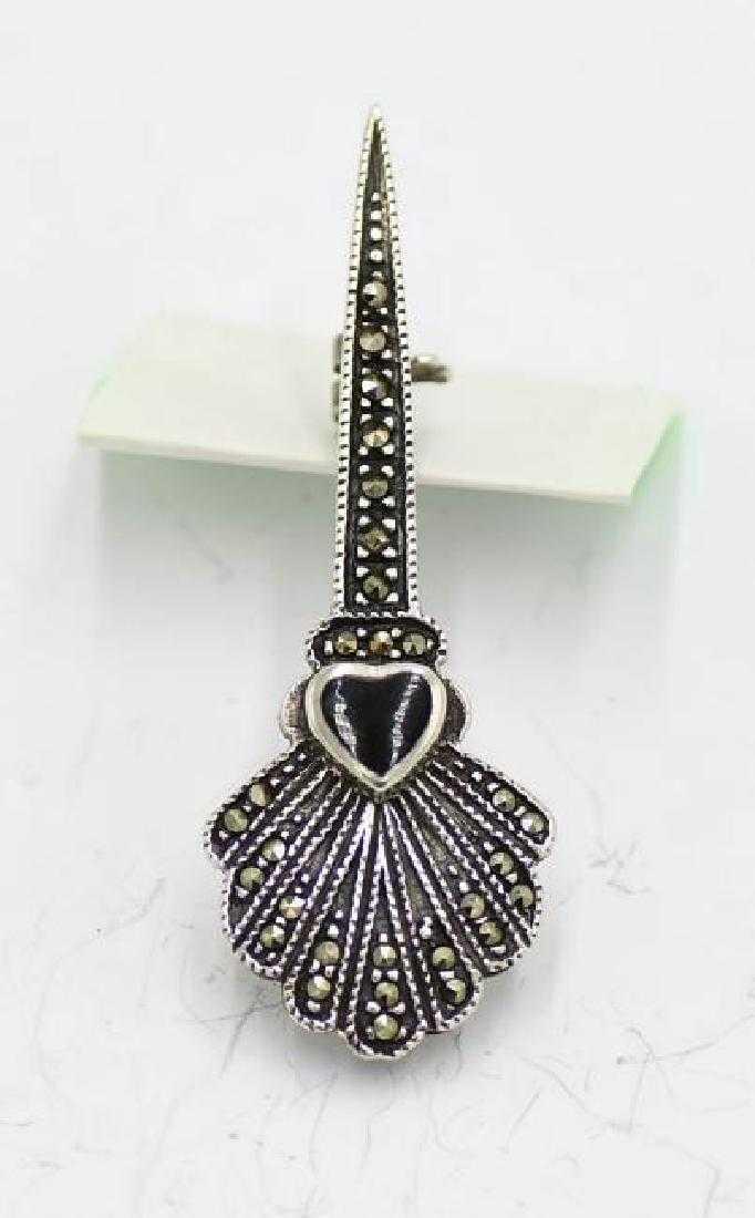 Vintage .925 Silver, Onyx & Marcasite Brooch: Vintage .925 Silver, Onyx & Marcasite Brooch. 2.12" long x 0.75" h. 0.20 ozt.
