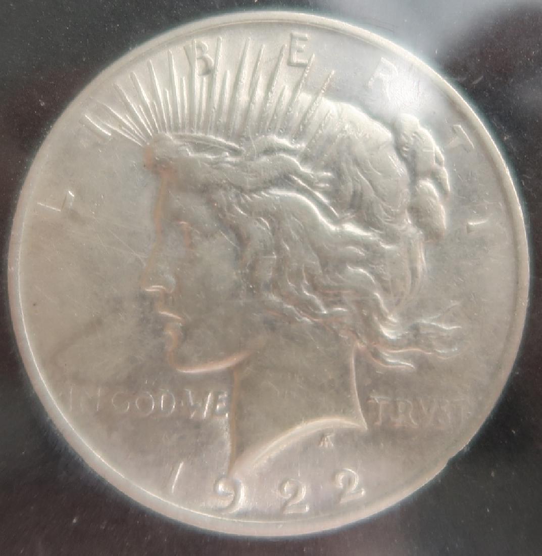 1922 Silver Dollar: 1.5" diameter