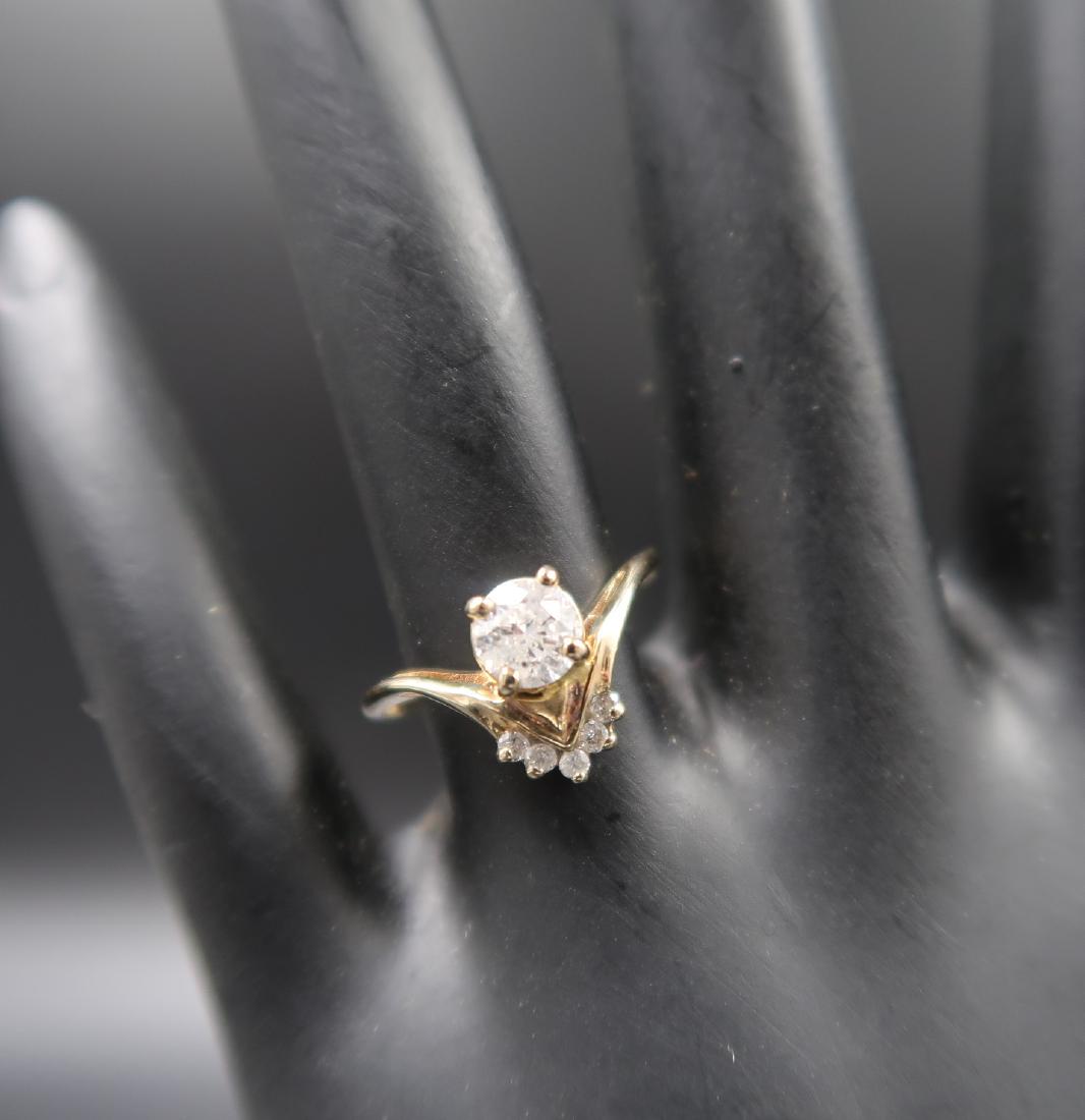 10k Gold Diamond with 5 small: Ring size: 6