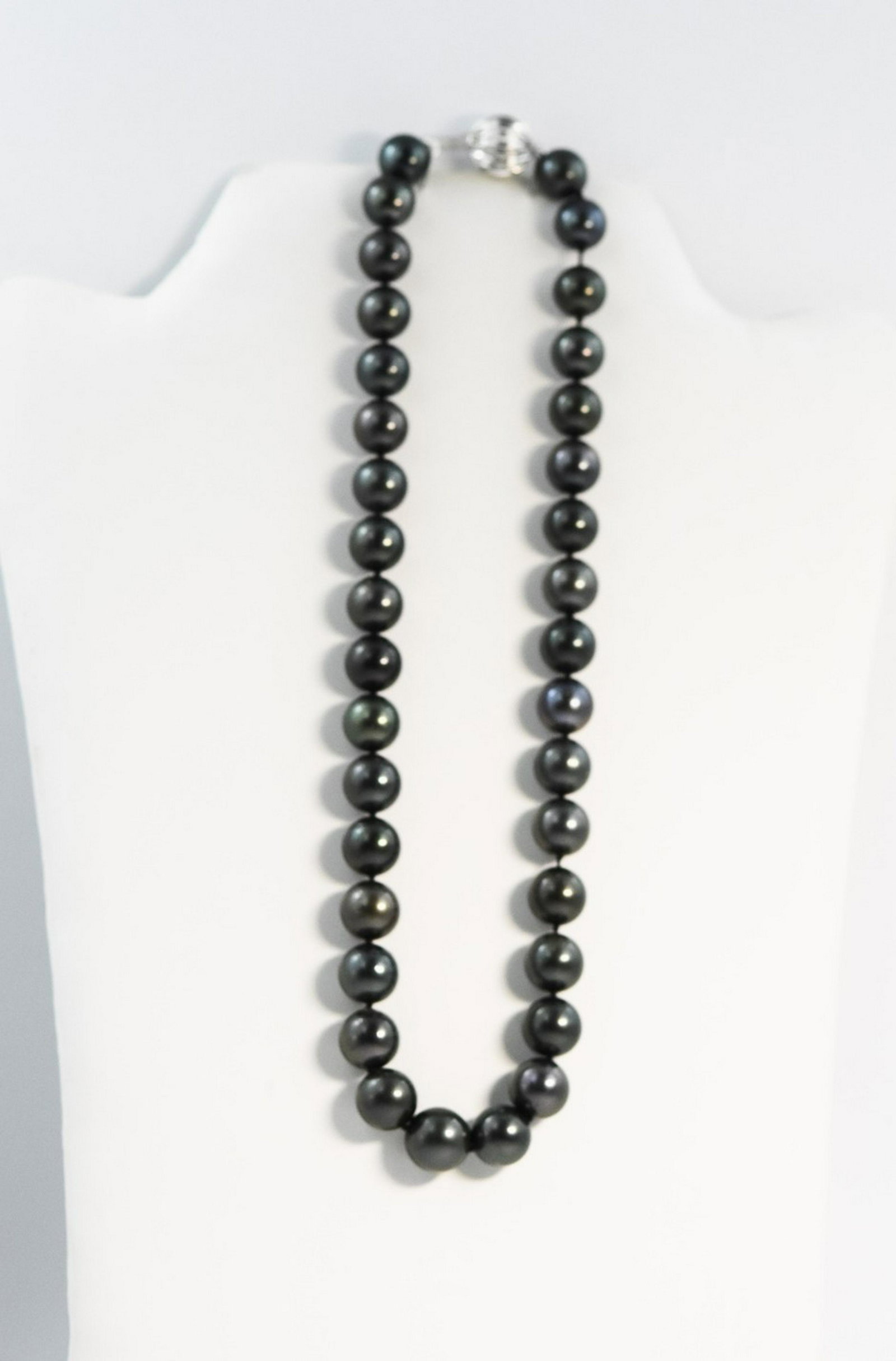 35 Tahitian Black Pearls 11-13mm Necklace clasp 14k: The strand has each pearl individually hand knotted & measures 18" in length. The necklace is finished w/ a scalloped 14k white gold plunger bead clasp. 35 Pearls/ 11-13 mm measurement Appraisal made 