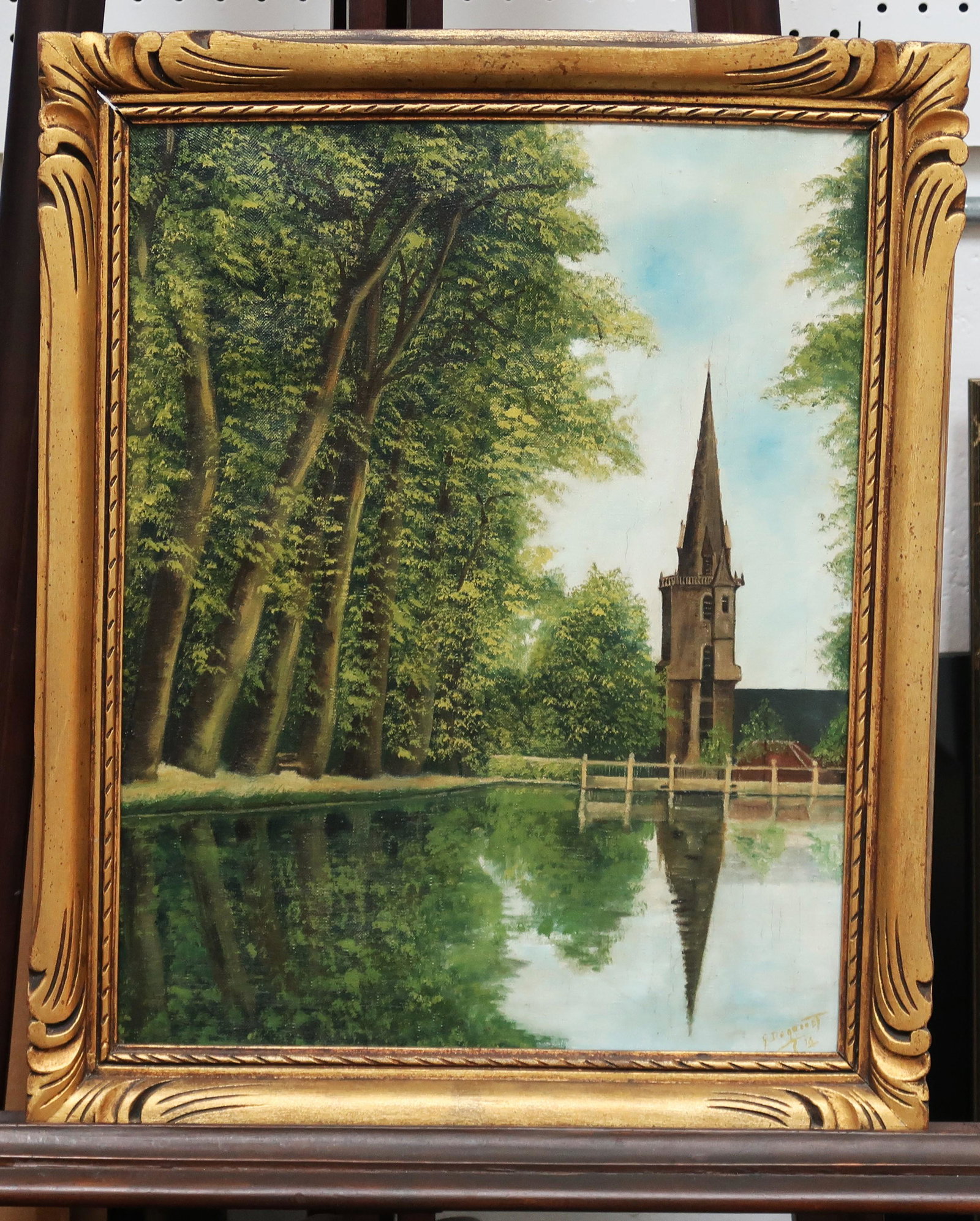 By G. Degroodt Oil Painting "Church": Vintage painting at Lake lined with trees and a church with a tallsteeple, both are reflected into the water giiiiving a sense of infinity and self-reflection. Painting size: 20" x 16"; w/ frame: 23" 