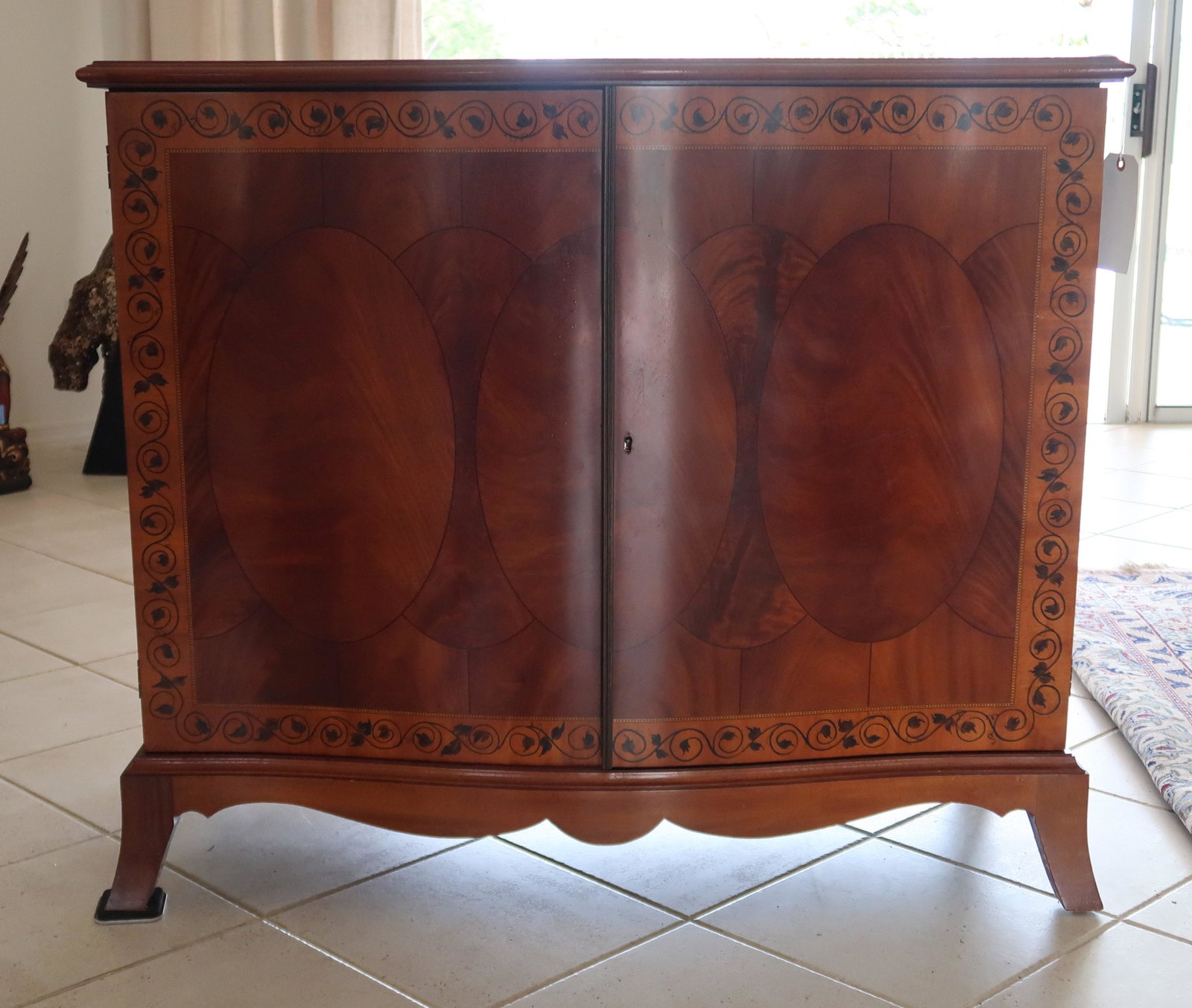 French Louis XV Fiddle Back Mahogany Trm Inlay in Edges: Size: 36 1/2" H X 42"W X 21"D.Cabinet Veneer.Origin From Germany C1920s, 42"W x 36"H x 21"D.Bombay front doors elongated OGEE Table Edge.