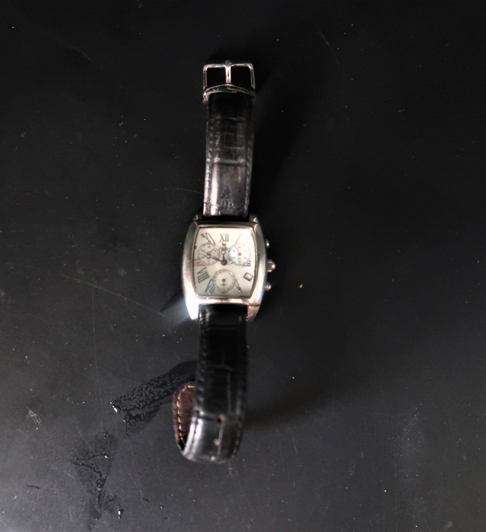 Lucien Piccard Chrono Silver Tone Watch: 3ATM water resistant stainless steel case, 26495Bk Sapphire coated crystal Swiss. Size: 1 3/4" x 1 3/8".