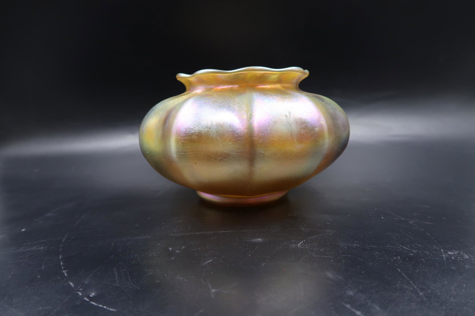 LC Tiffany Favrile Bowl Butiful shades of Gold: LC Tiffany Favrile Bowl Marked 1073 - 8610L Gold Bowl Ribbed With a scalloped top. Size 5"W x 3.5"H