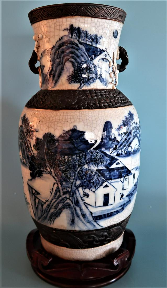 19th/20th Century Chinese Porcelain Crackle Gaze: 19th Century Chinese blue and white porcelain vase with flared rim. Seal mark to base.