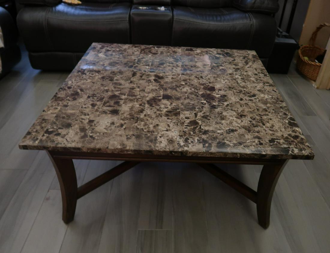 Marble Sqaure Top Cocktail Table: Start bids $5, this item without reserve. Square Marble top, Wood cherry leg. Size: 18"H x 38"W.
