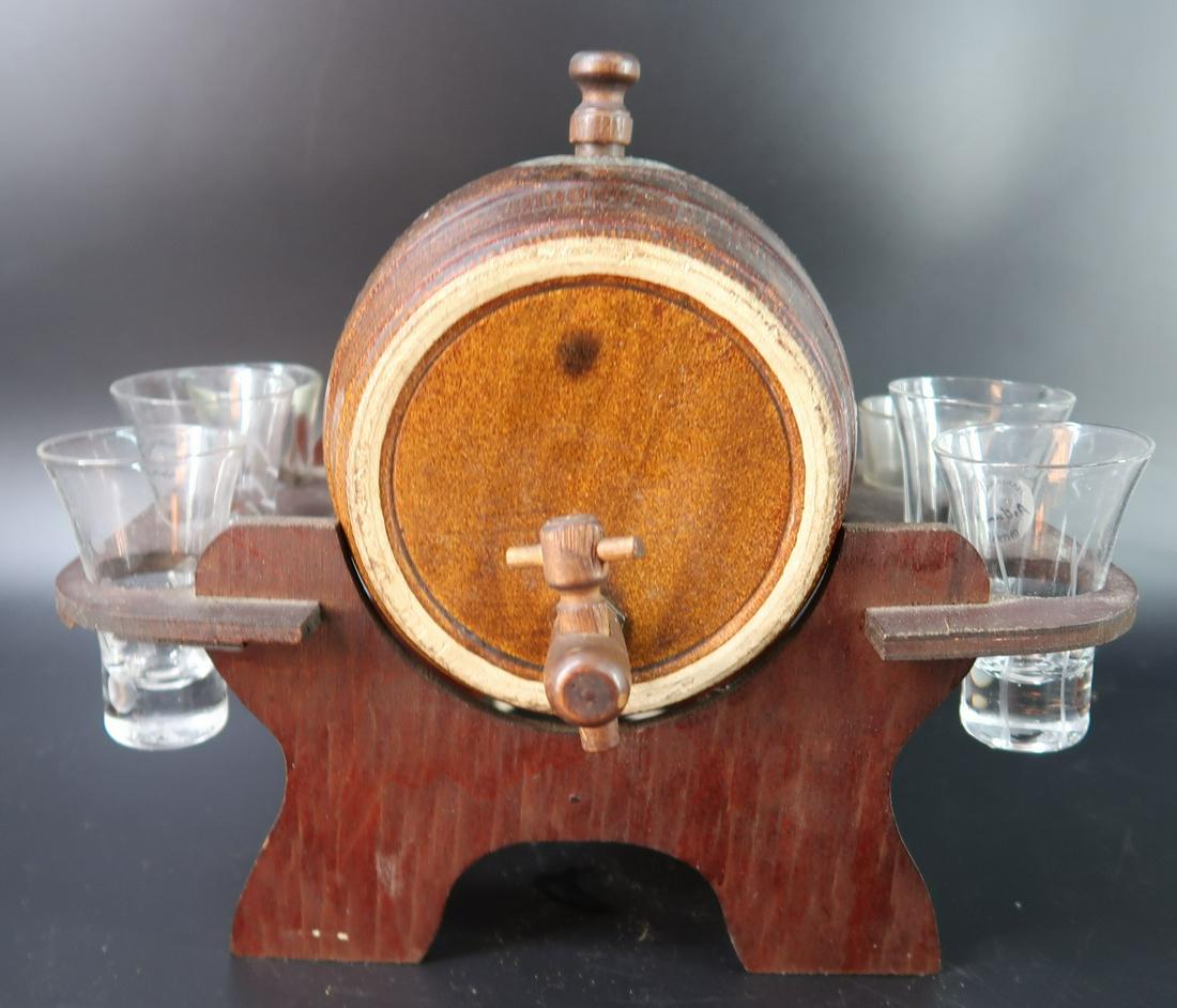 Whiskey Barel Radio/ 6pcs. Glass: Size: 11" x 8" x 7 1/2"w This barel is a AM/FM radio with 6pcs of glass, plug in.