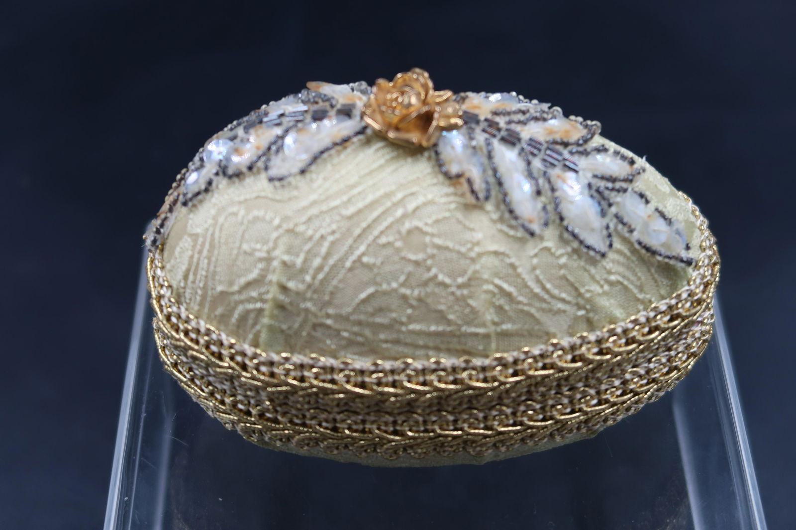 Gold Rose Fabric covered Egg, from Italy: Size: 4" x 2 1/2"Gold Rose Fabric covered Egg, from Italy
