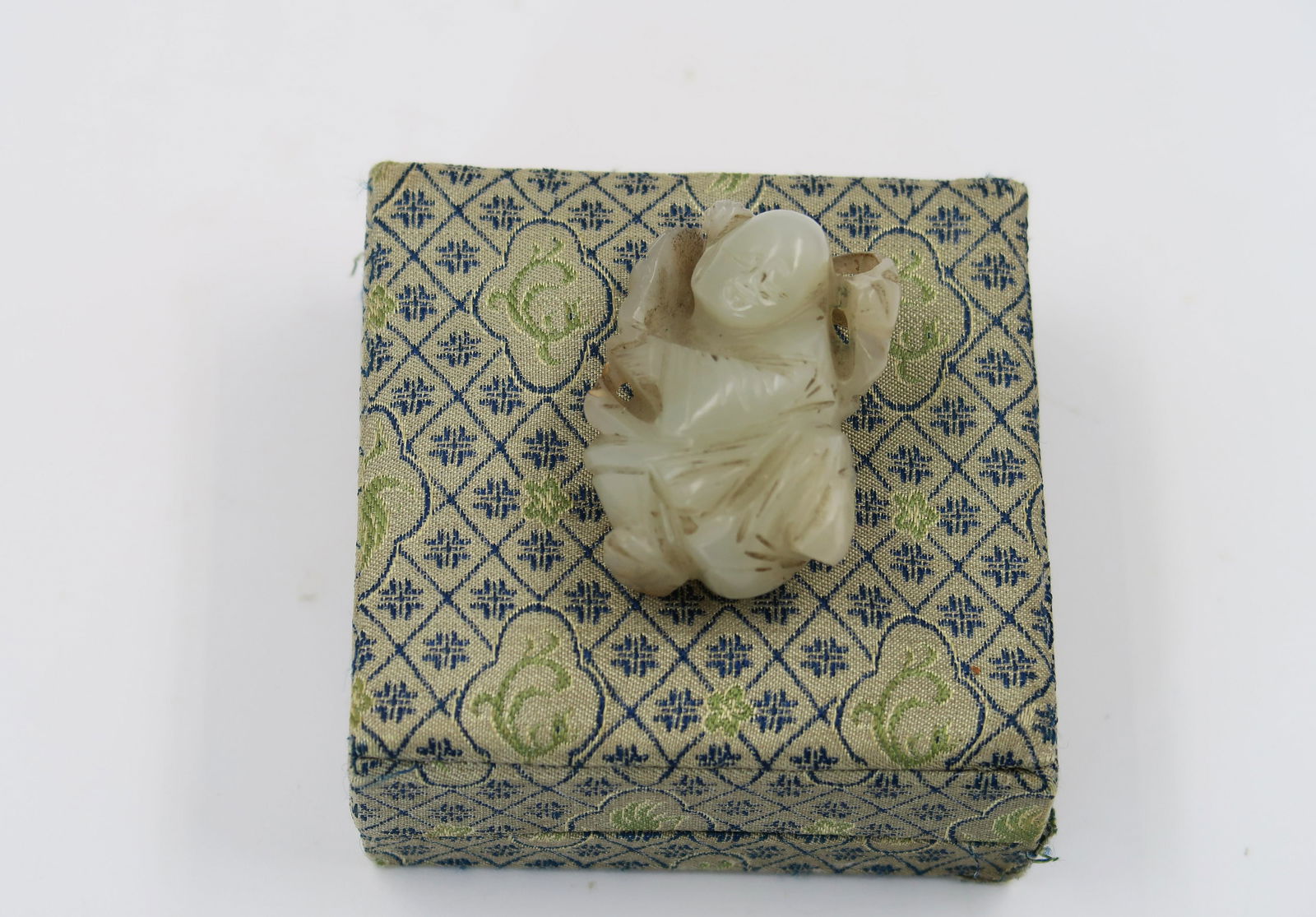 Chinese Carved Jade o Baby: Ancient Chinese carved jade of baby. Size: 1 1/2" H.