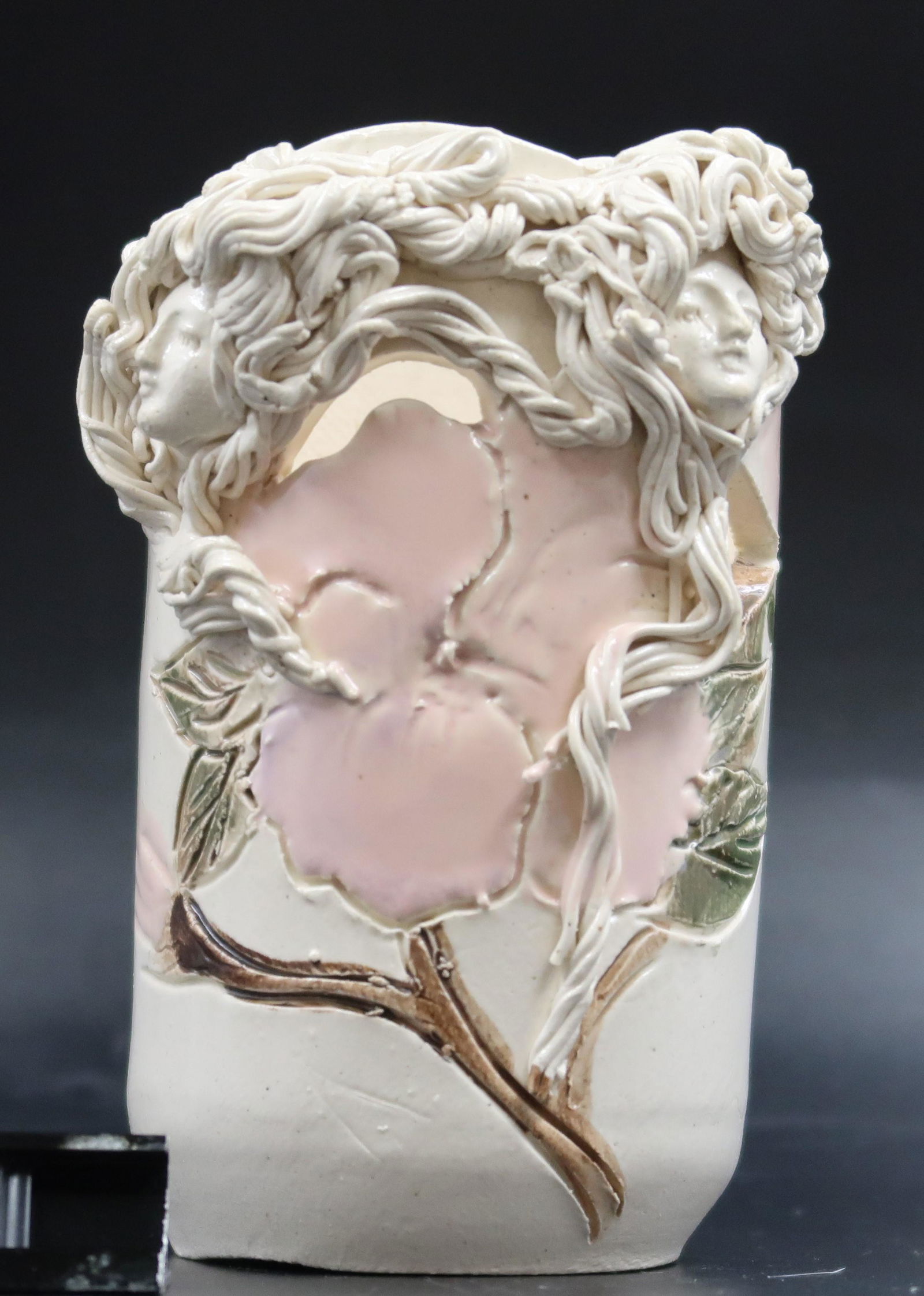 Manna L. Art Sclpture in Pottery Hand Made Art Nouveau: Size 4 1/2" Hand Made carved faces Art Nouveau design unreal