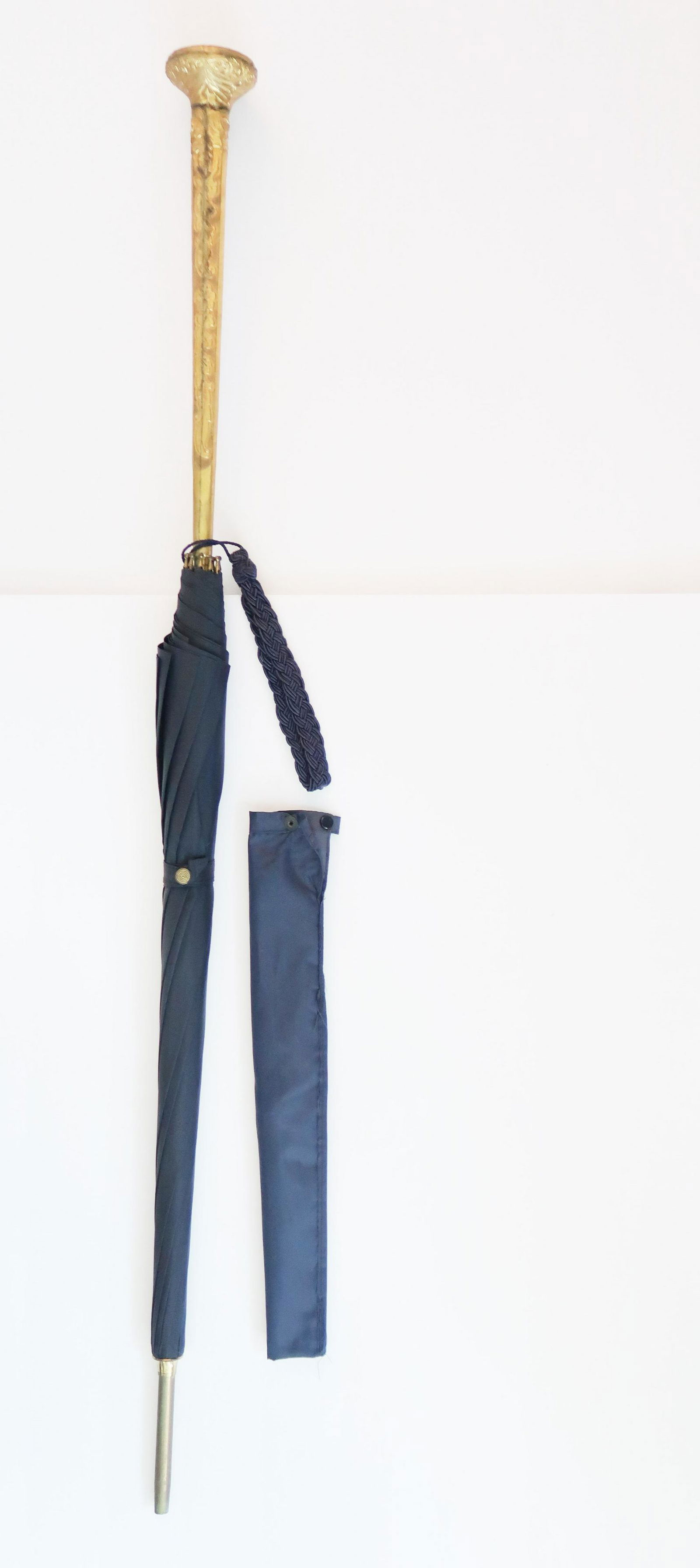 Marjorie Merriweather Post would Not Be Sean W/ A Cane: Marjorie Merriweather Post would Not Be Sean With A Cane So she added a Umbrella to camouflage the Cane. This stable cane was only used as a cane never a umbrella. This was designed only for Mrs. Post