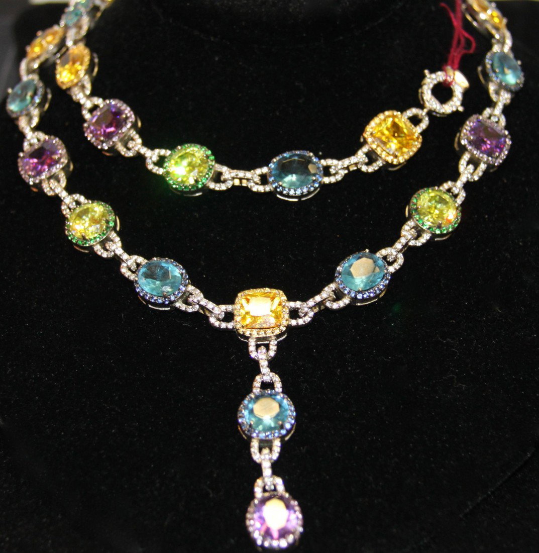 Necklace & Bracelet Colored Stones in Silver Set: 141 Necklace w/ Multi Colored Stones set in Silver, in the manor of David Yurman design. Total multi stone weight approximately 22 carat. Necklace size:17(in) w/ 2.5(in)drop Weight= 2.20 oz. Bracelet 