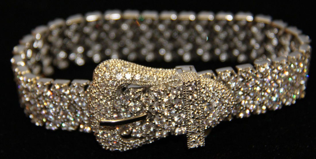 Bracelet Buckle Belt Cartier Style: Bracelet Buckle Belt, in the Manor of Cartier 30 carat weight Cz, size: 9(in) long. Weight= 1.83 oz.