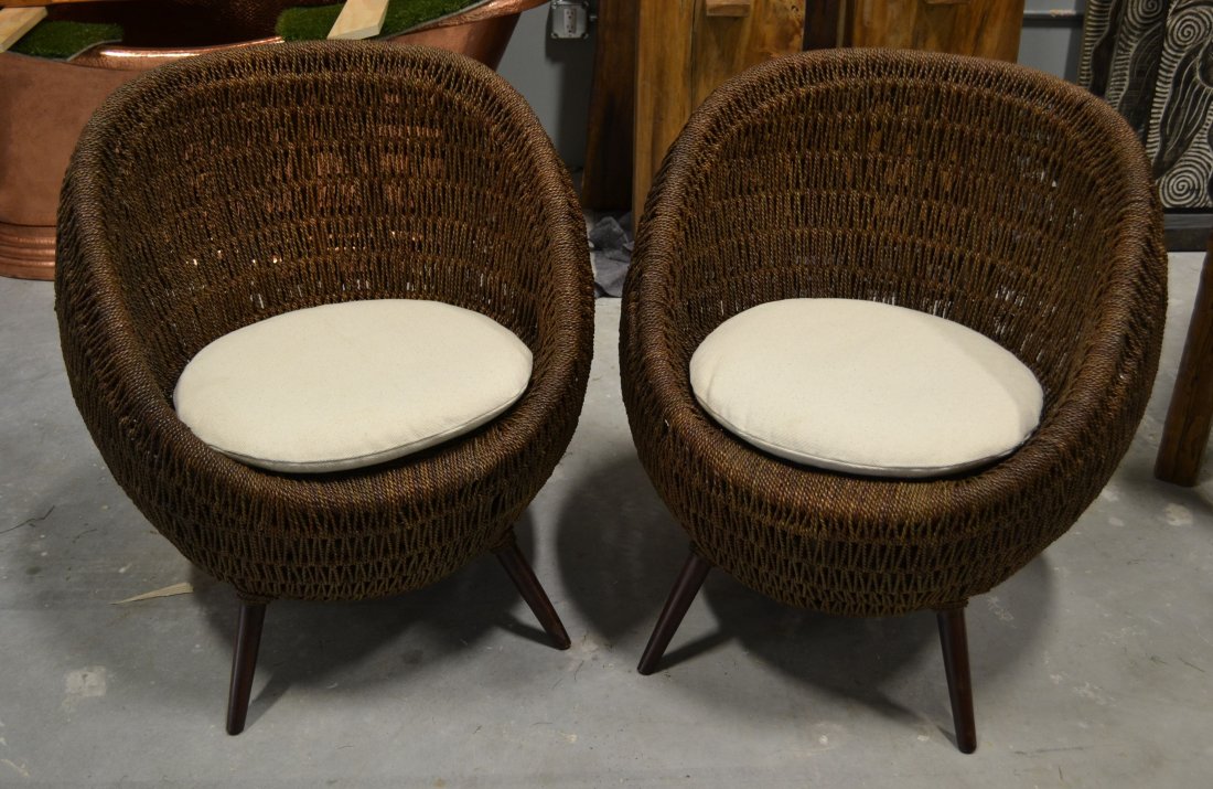 Bora bora chairs: The Bora Bora Chairs is suitable for outdoor use and features rattan with palisander legs for a modern appeal. Lot of (2). 26L X 27W X 32H/in