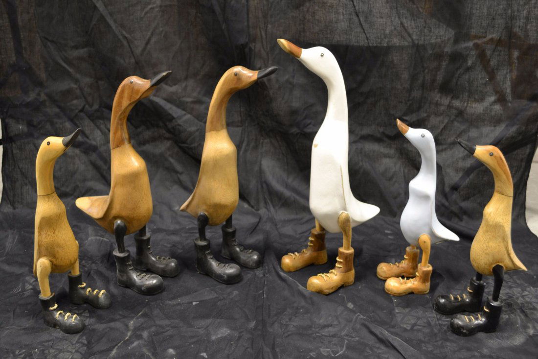 Ducks with boots: Bamboo and teak pastel. Lot of (6). 11 3/4L X 6W X 17 3/4H/in