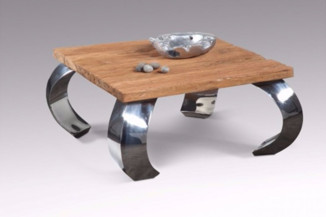 Verdana coffee table: Verdana coffee table The Verdana Table is made from a recycled teak wood with stainless steel legs. It pays homage to vintage railroad ties and compliments any outdoor or indoor living areas. Dimensio
