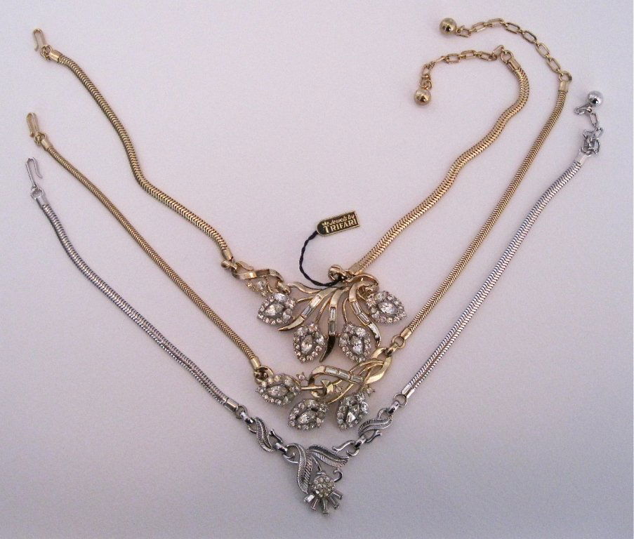 Lot of 3 Trifari Necklaces: Lovely lot of 3 Trifari Necklaces All Rhinestones, very nice settings. 2 Goldtone 1 Silvertone. Approximate Measurements 15"