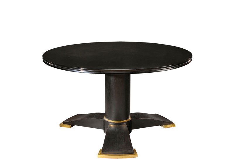 JULES LELEU (1883-1961) & KATSU HAMANAKA(1895-1982: Rare low circular table in black lacquered and darkened woodwith large gilded bronze finish. Numbered. Circa 1940. 20 in. (51 cm) high, (82 cm) diam