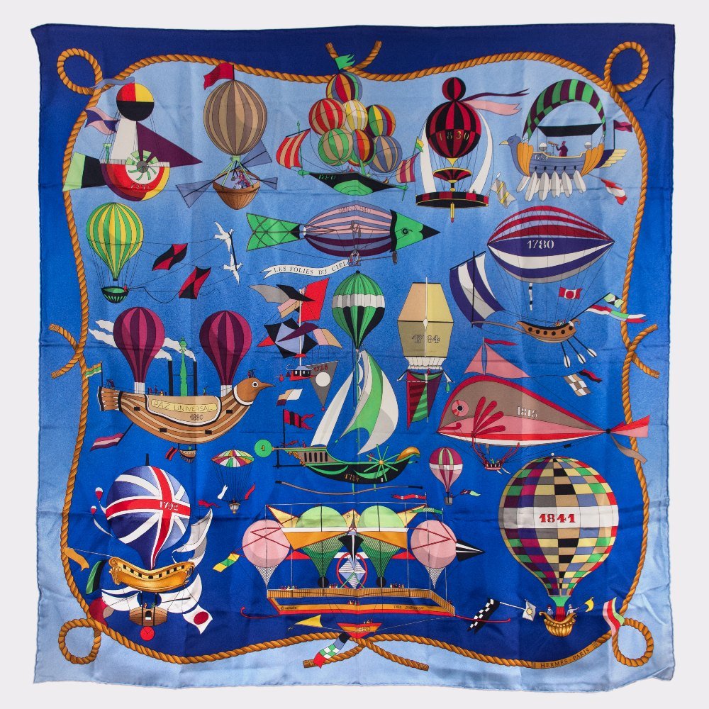 Hermès: Silk Scarf 90 x 90 cm "Les Folies Du Ciel" By Loic Dubigeon in Royal Blue and Light Blue