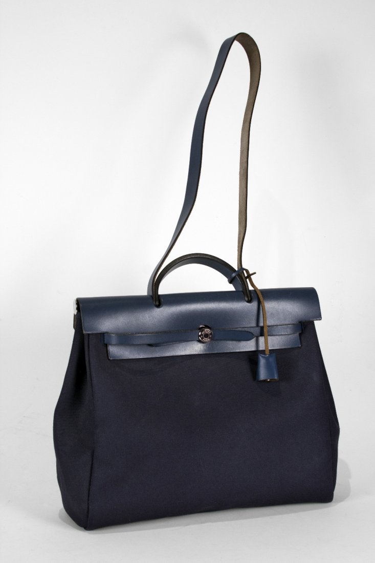 Hermès: interchangeable Herbag, in Navy Canvas with Leather Strap and Trimming. Including Clochette and Lock, Silver Hardware Very Good Condition