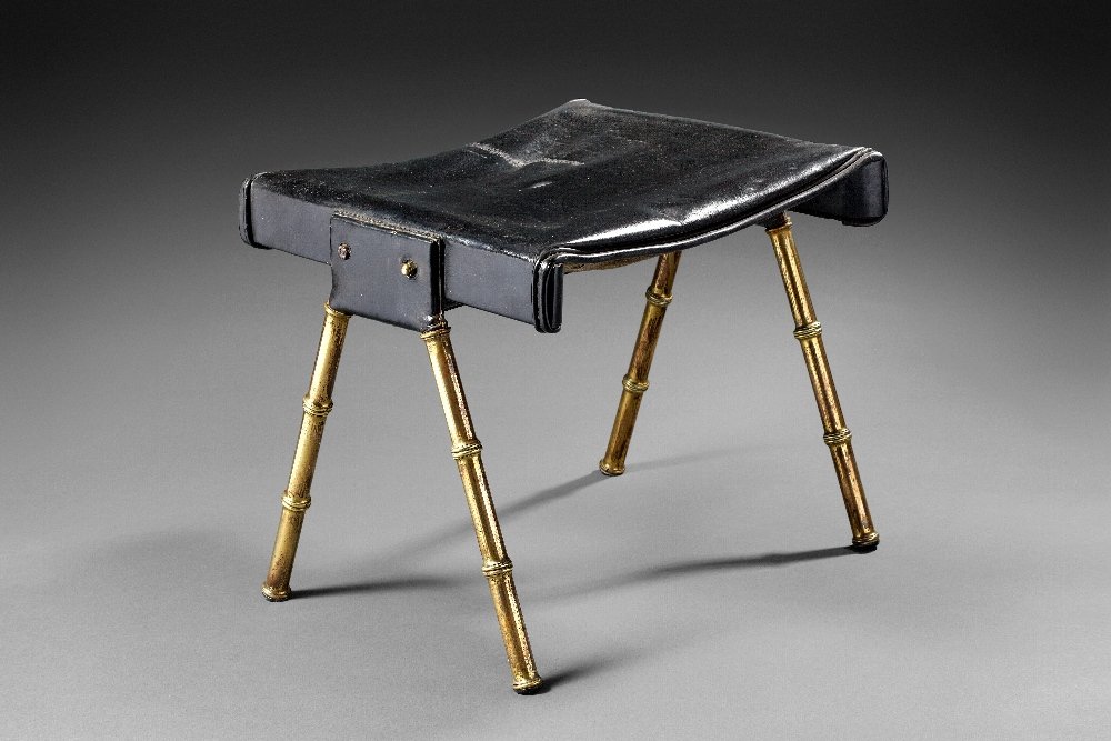 Stool: Jacques ADNET (1900-1984) Stool Leather and metal 14.2 x 17 x 13.4 in. - 36 x 43 x 34 cm.