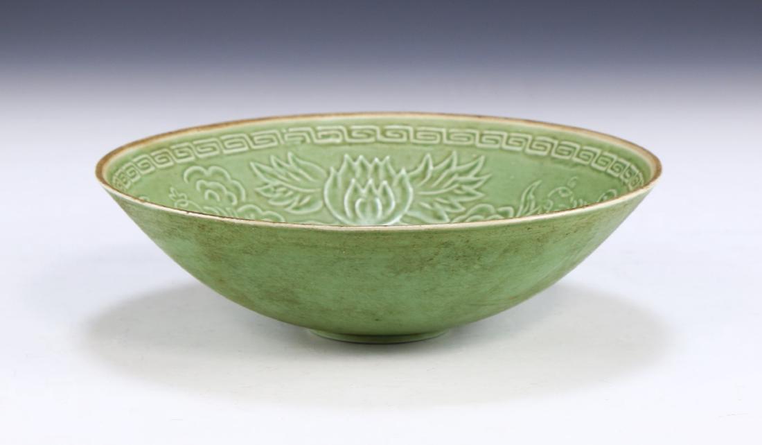 A CHINESE ANTIQUE DINGYAO INCISED PORCELAIN BOWL: A Chinese Antique Dingyao incised Porcelain Bowl: Deep And Finely Potted With Rounded Sides, The interior Painted With Three Celestial Figures Amid Large Blooming Lotus Flowers, Rising To A Rim Painte