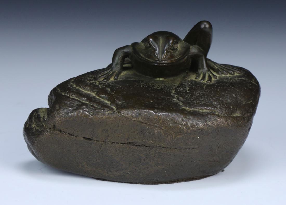 A STONE CARVED PAPER WEIGHT (1 of 4)