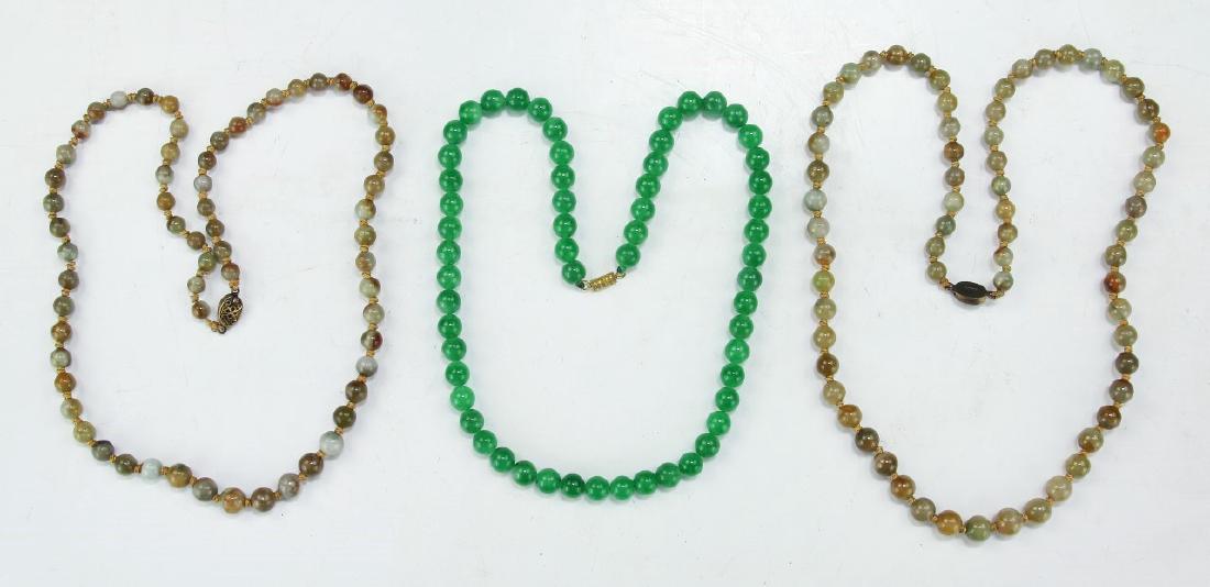 THREE (3) JADE OR STONE BEADED NECKLACES (1 of 2)