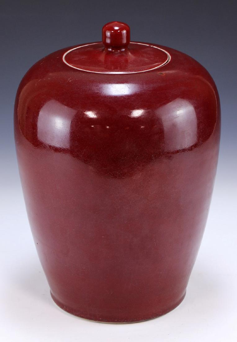 A CHINESE ANTIQUE OX BLOOD RED LIDDED PORCELAIN VASE (1 of 5)