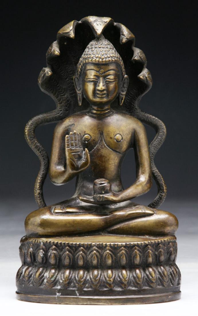 A CHINESE ANTIQUE BRONZE BUDDHA: A Chinese Antique Bronze Buddha: Finely Molded As Buddha Surrounded By Snakes While Seated On A Double Lotus; Size: H: 7-1/2" (19.05cm)