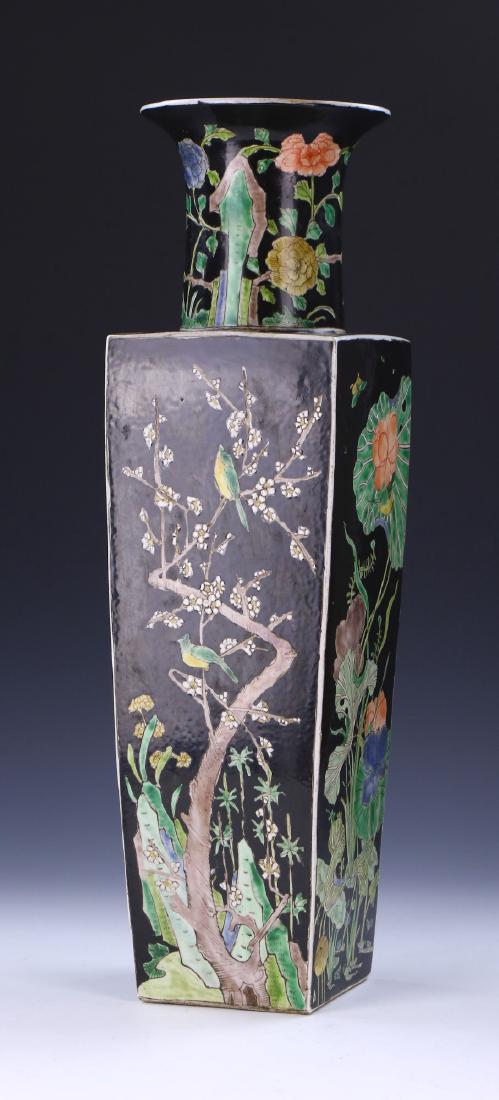 A BIG CHINESE ANTIQUE FAMILLE ROSE PORCELAIN VASE: A Big Chinese Antique Famille Rose Porcelain Vase: Of Squared Form, Rising To A Cylindrical Neck And Splayed Rim, Body Finely Painted With Birds Perched On Thin Branches Amid Rockery And Sprouting Lil