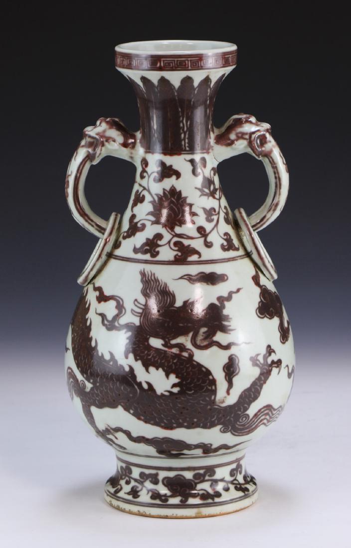 A CHINESE ANTIQUE UNDERGLAZED RED PORCELAIN VASE (1 of 5)