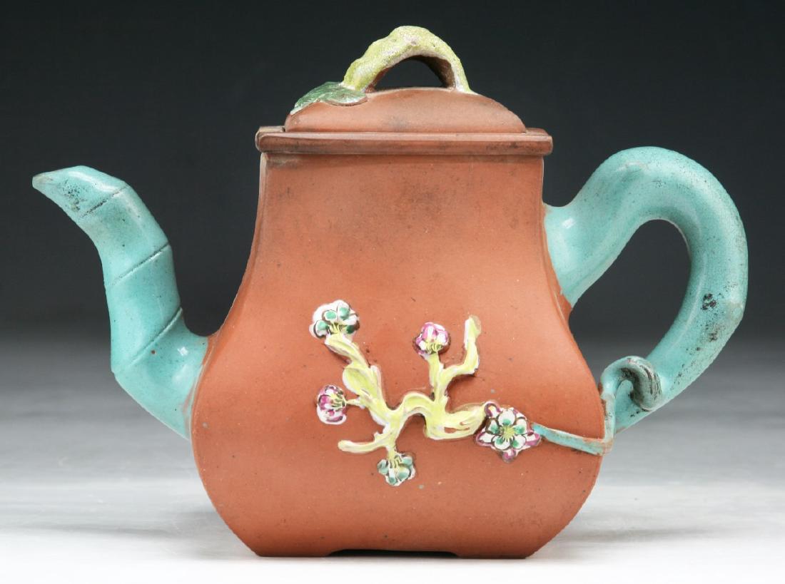 A CHINESE ANTIQUE YIXING POLYCHROME ZISHA TEAPOT: A Chinese Antique Yixing Polychrome Zisha Teapot; Size: L: 8" (20.32cm)