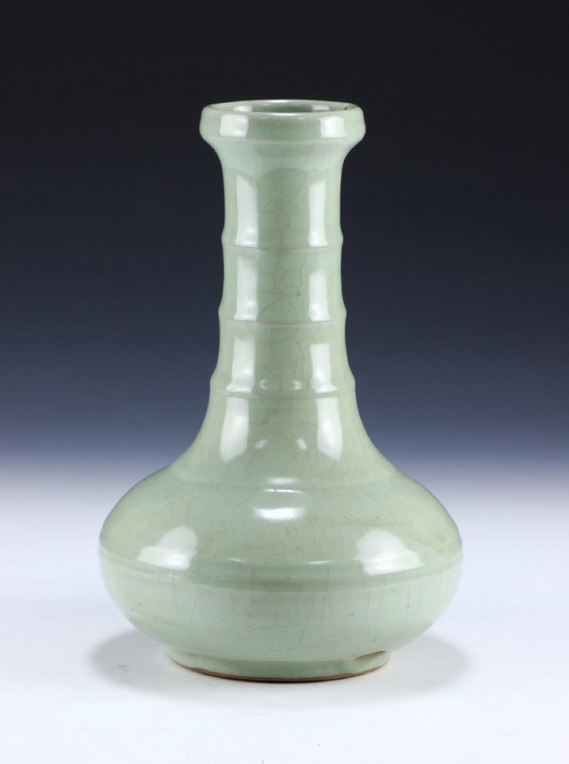 A CHINESE ANTIQUE CELADON GLAZED PORCELAIN VASE (1 of 4)