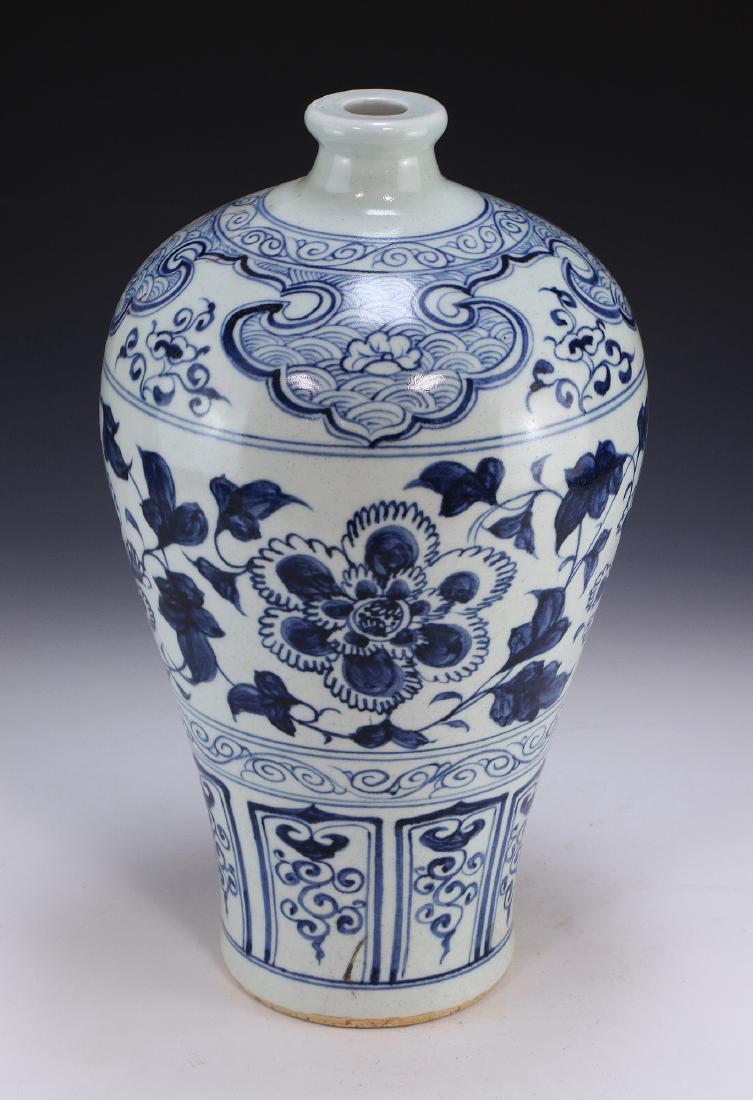 A Chinese Antique Blue & White Porcelain Vase: A Chinese Antique Blue & White Porcelain Vase: Of Shouldered Shape, Finely Decorated With Blooming Flower Figures Across The Body, Extending To A Small Neck And A Flared Rim; Size: H: 15" (38cm)