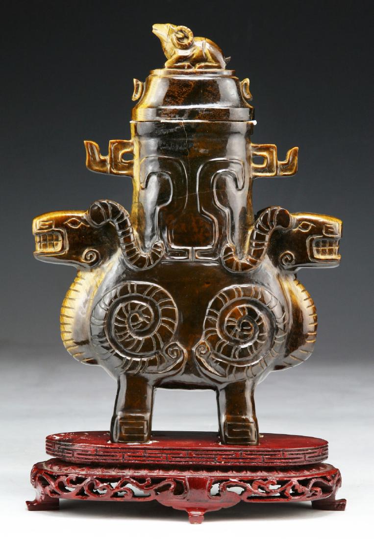 A CHINESE TIGER EYE CARVED VASE WITH COVER (1 of 2)