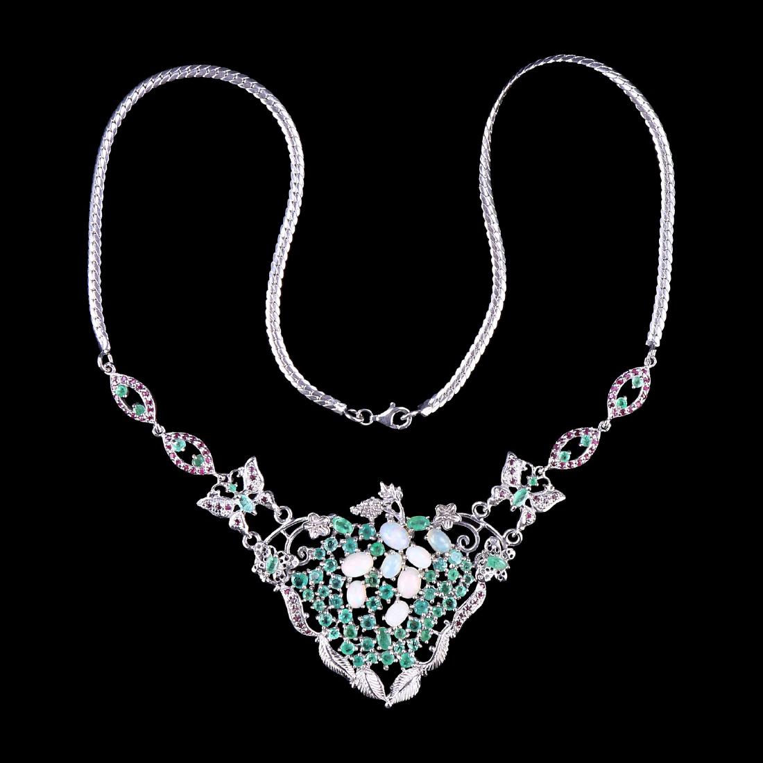 A NATURAL EMERALD, PEARL, & RUBY NECKLACE (1 of 3)