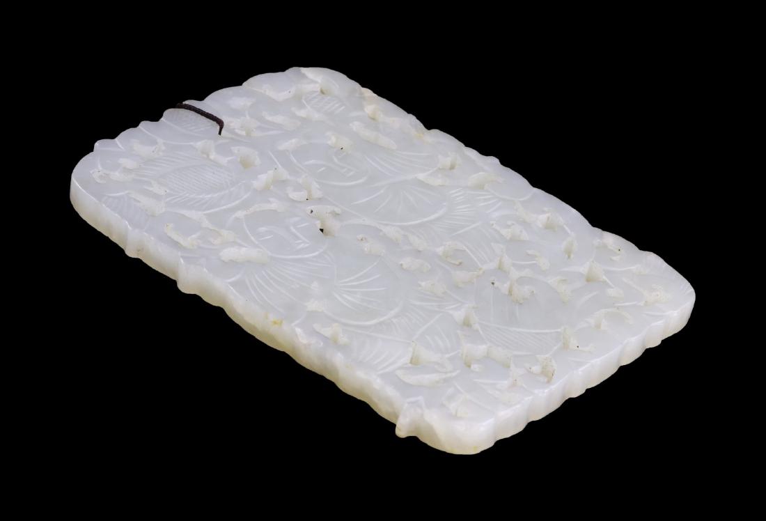 A CHINESE CELADON JADE PENDANT (1 of 2)