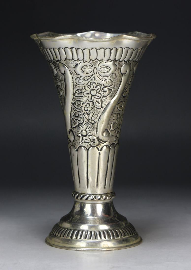 A JAPANESE ANTIQUE SILVER CUP: A Japanese Antique Silver Cup: Of Conical Form, Rising From A Splayed Base To A Flared Rim, Body Finely Cast With Continuous Sprouting Blossoms; Size: H: 8-1/2" (21.59cm)