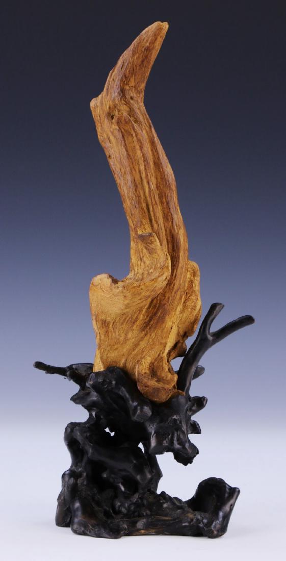 A VIETNAMESE NGA TRANG CHENXIANG WOOD FORMATION: 沉香雕山子 A Vietnamese Nga Trang Chenxiang Wood Formation: The Wood Has Been Meticulously Trimmed To Leave A Irregular Log Containing Dense Specks Of Resin Through Out, 