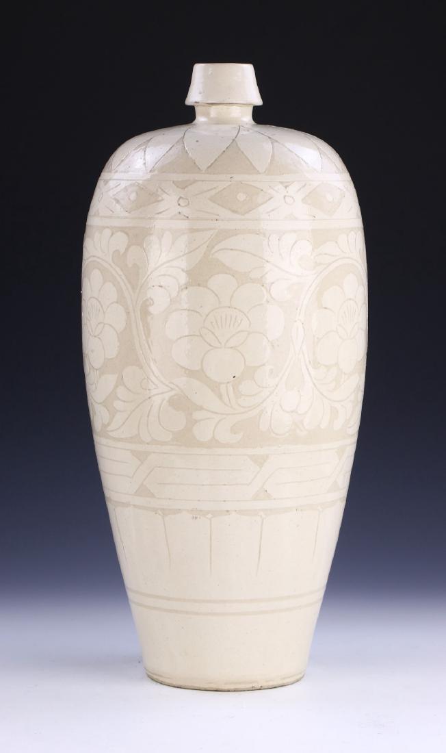 A BIG CHINESE ANTIQUE WHITE GLAZED PORCELAIN VASE: A Big Chinese Antique White Glazed Porcelain Vase: Of Ovoid Form, Rising To A Well Potted Garlic Head Rim, Body Finely Painted With Sprouting Lotus Blossoms Amid Continuous Swirling Stems; Size: H: 17