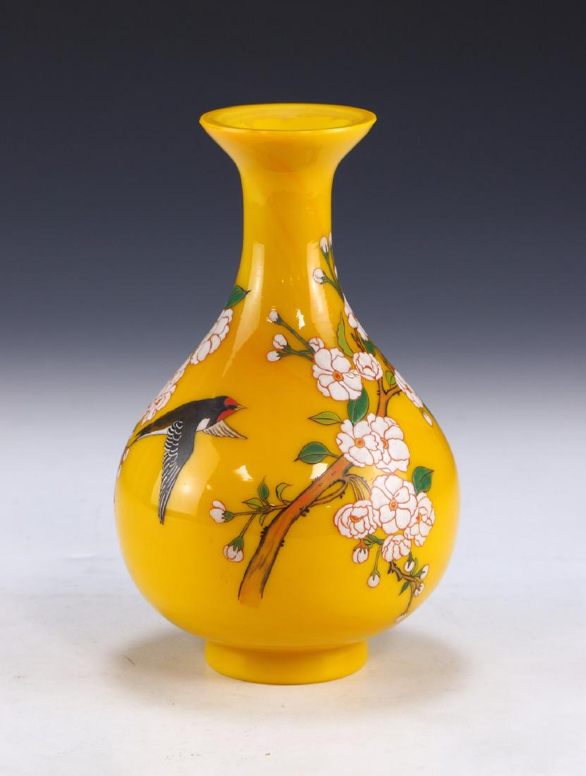 A CHINESE ANTIQUE YELLOW PEKING GLASS VASE: A Chinese Antique Yellow Peking Glass Vase: Of Pear Shape, Body Finely Painted With Two Birds in Flight Amid Sprouting White Blossoms And Thin Branches, Four Character QIANLONG Mark On The Base in Cob