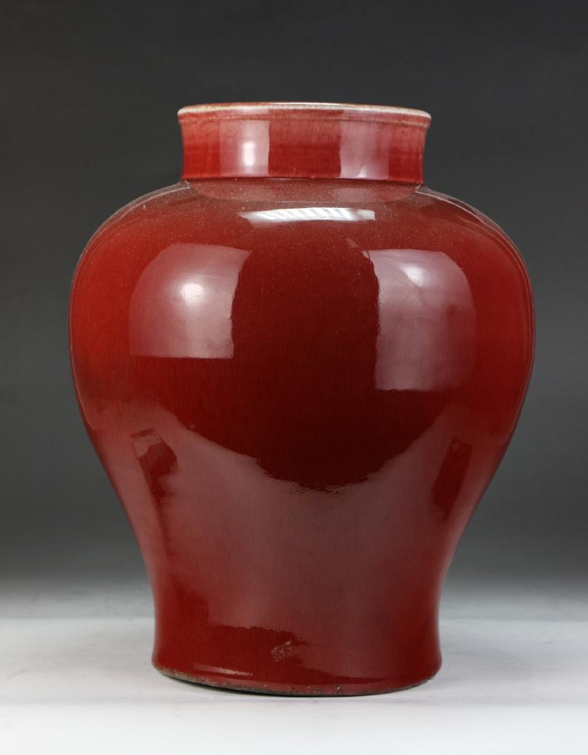 A CHINESE ANTIQUE OX BLOOD PORCELAIN VASE (1 of 6)